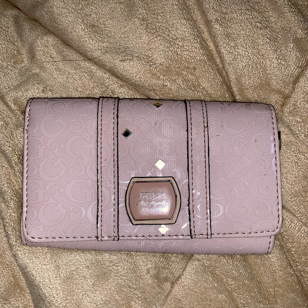 Guess wallet. light pink on the outside, champagne on the inside.
